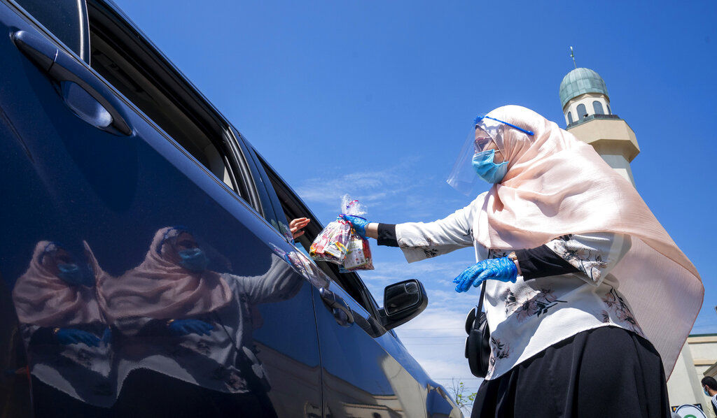 APTOPIX Virus Outbreak Eid al-Fitr Holiday Canada